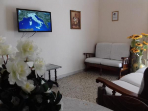 Отель Casa Vacanze Luigi Sergio - affitto breve  Санто Стефано Ди Камастра
